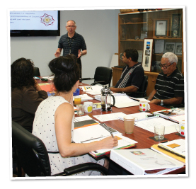 CAAC board members in training. Bob Turner (standing) and George Donaldson (seated at the right next to Bob) from ORIC’s Alice Springs office provide corporate governance training specifically tailored to the corporation’s needs—one of the many advantages of registering under the CATSI Act. Photo courtesy of Central Australian Aboriginal Congress (CAAC) Aboriginal Corporation.