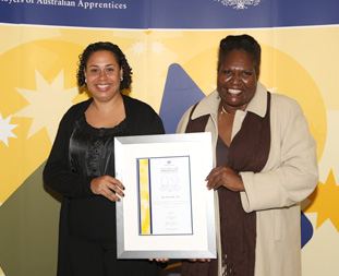Receving an award in Canberra LtoR Mary Yoelu (President), Linda Wapau (Vice President)