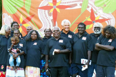 Members of the Red Lily Health Board Aboriginal Corporation at the official launch of its services: Daisy Yarmirr, Mary Djurundudu, Rhoda Nglmaku, June Nadjamerrek, Rosemary Nabulwad, Ross Guymala, Rueben Cooper, Michael Bangalang, Sampson Henry, Christopher Galaminda with baby Tyson—future chairperson or CEO of Red Lily.