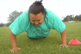 Founder and coordinator Noelene Skinner (green t-shirt) shows her pushup skills
