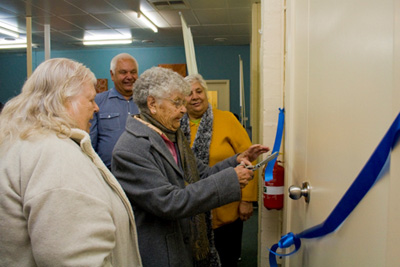 Aunty Irene Harrison, Aunty Jessie Clarke and Aunty Faye Marks officially open the offices watched by BGLC director, Frank Clarke