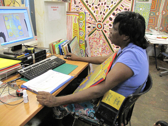 Sharon Nampijinpa Anderson at the computer. 