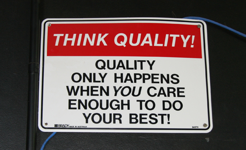 Sign saying "think quality"