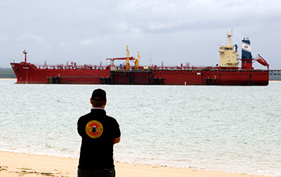 CEO of Rirratjingu Aboriginal Corporation, Stuart Maclean, overseeing a shipment of fuel