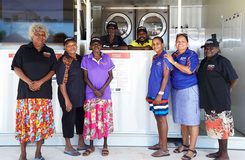 Staff and corporation directors at the new laundry in Barunga