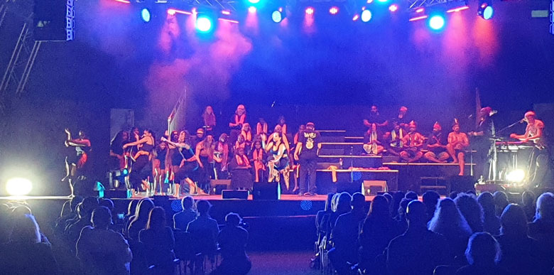 Members of Iwiri Aboriginal Corporation singing in a collaborative performance with musicians and dancers at the Adelaide Fringe festival, 20 February 2021