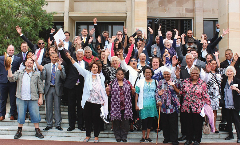 Crowd of Noongar on the steps of Western Australia's parliament following the passage of the Noongar Recognition Act