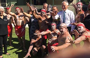 Prime Minister Malcolm Turnbull dancing with a group of Aboriginal men