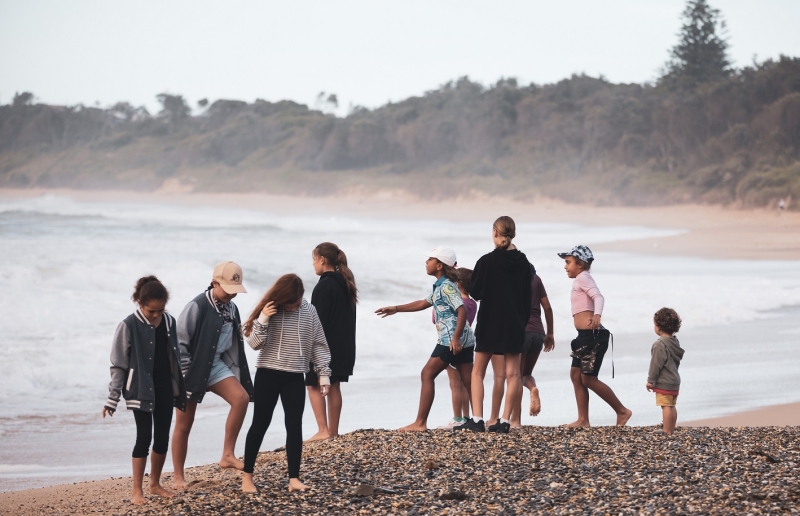 A group of young people on a beach